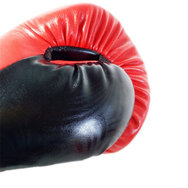 Adult boxing gloves in black and red, ideal for fitness training and martial arts self-defense.