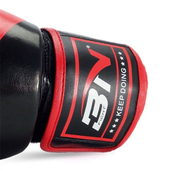 Adult boxing gloves with red and black design, featuring brand logo and motivational slogan.